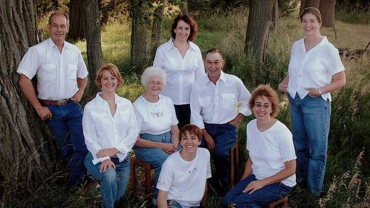 Merle and Jean Gerkins pose with their six children in a 2012 family photo